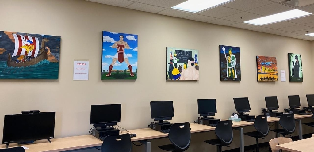 Paintings at New Castle Ivy Tech representing each of the Hnery County schools.