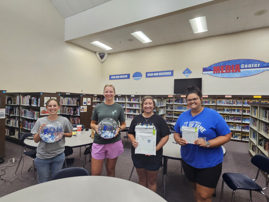 Randolph Eastern educators share the prizes they won. 
